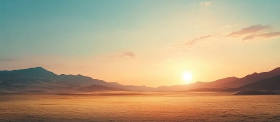Aufkleber - Sunset over mountain landscape with clear sky and golden light on horizon Copy Space