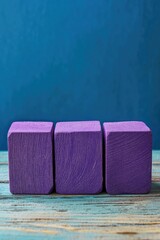 Wall Mural - Purple wooden blocks stacked