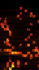 Aufkleber - Vertical video animation with  neon orange fire particles spread across a black background