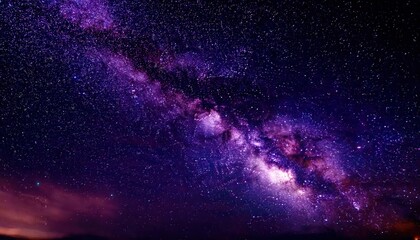 Wall Mural - breathtaking view of the milky way galaxy with vibrant purple hues and star clusters, perfect for celestial or cosmic themed projects