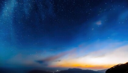 Wall Mural - ethereal nightscape of the milky way and vibrant horizon over misty silhouettes, perfect for cosmic themed design or tranquil wall art