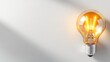 © JoxyAimages - A stunning image of a glowing filament light bulb, beautifully illuminated against a clean background, symbolizing creativity and inspiration in an elegant design.
