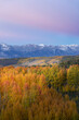 USA, Colorado, Uncompahgre National Forest. San Juan Mountains and aspen forest in autumn sunset.