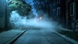 © Anisah - A mysterious fog rolls down a dark urban street at night creating an eerie scene