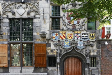 Historic city centre of Delft, Gemeenlandshuis van Delfland, oldest stone-built house in Delft, Gothic-style town hall, magnificent portal with coat of arms, Delft, South Holland, Netherlands