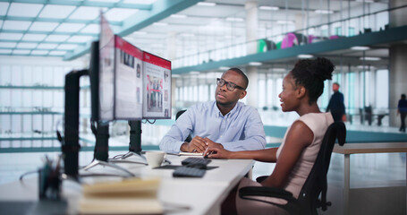 Wall Mural - looking at news in online newspaper