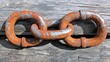 © PB Studio - weathered chain link broken into pieces, lying across an old wooden surface with a soft light highlighting the rust, symbolizing the end of oppression. struggle for freedom.