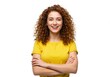 © PP Creative - A cheerful young woman with curly hair, wearing a yellow shirt and crossing her arms