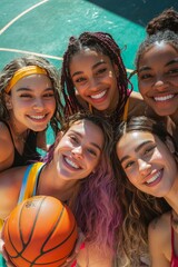 A close-up of six friends smiling and posing together in a vibrant outdoor basketball court