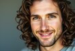 © iushakovsky - Portrait of a man with long hair and a calm expression