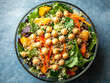© NNS Studio - top view vibrant quinoa salad round glass bowl chickpea bell pepper carrot green fresh vegetable healthy recipe plant-based meal food photography leafy dining tasty snack lunch casual raw farm crunchy