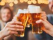© Preeyanuch - A joyful celebration with friends, clinking glasses filled with refreshing beer in a warm and festive setting.