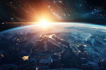 Wall Mural - sunrise is illuminating europe as seen from space with city lights visible