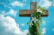 © Lubos Chlubny - Wooden cross with white lilies and ivy against blue sky