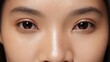 © PrimeOrdial - Close-up of an east asian womans eyes