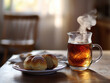 © MariLin - Suhoor meal with steaming tea and freshly baked bread on a simple table in early morning soft light_2