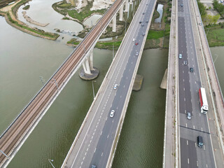 Wall Mural - River Thames at Rochester Town in the Unitary of Medway and Located at Kent, England United Kingdom. High Angle Drone's Camera Footage was Captured on April 20th, 2024