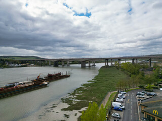 Wall Mural - High Angle View of River Thames at Rochester Town in the Unitary of Medway and Located at Kent, England United Kingdom. High Angle Drone's Camera Footage was Captured on April 20th, 2024