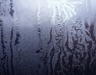 Wall Mural - closeup view capturing the intricate condensation of fog on a window glass surface, showcasing the d