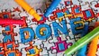 © Anna - Colorful puzzle pieces with markers featuring the word done - concept for achievement and completion