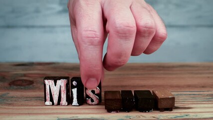 Wall Mural - mission. the word is spelled out using wooden alphabet blocks