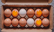© Morten - Dozen eggs are in a cardboard box with one egg missing. The box is open and the eggs are sitting on top of the cardboard