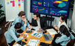 © InfiniteFlow - Wide top view of diverse group of business analyst team analyzing financial data report paper on meeting table. Chart and graph dashboard by business intelligence analysis. Meticulous