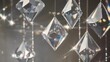 © Tom - Close-up shot of shimmering crystal prisms reflecting light, creating a dazzling display of colors and reflections.