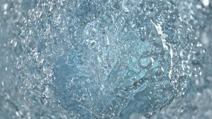 Wall Mural - super slow motion shot of water whirling in glass bottle at 1000fps.