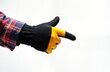 © miss irine - Mans hand in protective glove points to side. Construction worker wears plaid shirt. Isolated on white background. Indicates direction. Pro builder. Handyman. Repair concept. Useful for work tools