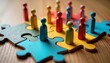© miss irine - Colorful wooden figures represent diverse people connecting on jigsaw pieces. Teamwork, diversity concept visualizes HR strategies for inclusive workplace cultures. Different colored figures connect