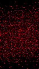 Aufkleber - red particles spread across a black background, Vertical video animation 