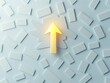 © Manutsanun - A glowing yellow arrow points upward amidst a textured gray background filled with rectangular shapes, symbolizing direction or progress.