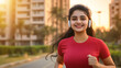 © UniqGraphicX - Young Indian woman jogging and running during sunrise. Healthy lifestyle and fitness concept