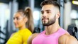 © aun - Young Man and Woman Focused on Fitness in a Modern Gym Setting