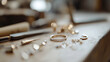 © forenna - Handmade Jewelry Close Up on Jeweler Workbench with Tools and Gems
