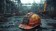 © Sugoi - Damaged hardhat rests in burnt factory demolition site