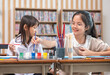 © Verin - portrait teen girls drawing watercolors in class,elementary students learning new skill of art during school break
