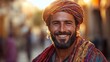 © IMAGINIAC - Smiling Man Wearing a Colorful Turban Outdoors