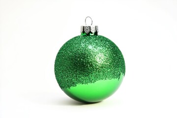 Wall Mural - A single green Christmas ornament against a clean white background, ideal for holiday-themed designs and decorations