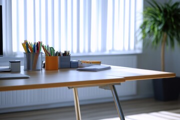 Wall Mural - A desk with various office supplies