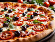 © PixlMakr - Delicious pizza with tomatoes olives and basil