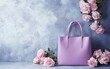 © Svitlana - Stylish structured tote in lavender displayed with delicate roses in a pastel-themed composition