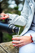 © Gusta Cabrera - Close-up of a woman's hands as she pours herself a mate herb.