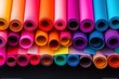 © Eugen - A vibrant assortment of colorful rolls of various types of paper are neatly stacked one on top of another for display or storage purposes. Hobbies and Leisure Activities Add color and fun to your days
