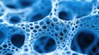 © STwul - Blue porous network structure, close-up, abstract background, scientific illustration