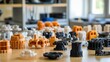 © Justlight - Many colorful plastic prototypes are lying on a wooden table in a manufacturing laboratory, showcasing the potential of additive manufacturing and rapid prototyping technologies