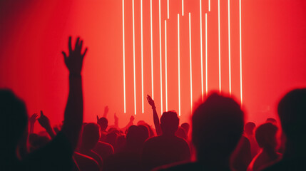 Abstract crowd silhouette with vibrant red lighting at a music festival