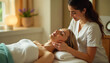 © cd - A young woman receiving a facial treatment from a female aesthetician in a spa setting, created with generative ai