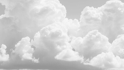 Wall Mural - Fluffy white clouds stretch across a seamless sky background. Background texture of fluffy white clouds. 